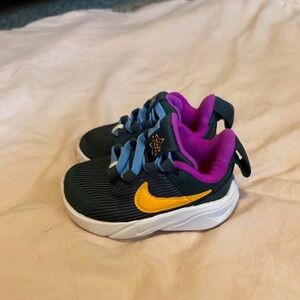 Nike Kids Sneakers with Yellow and Purple Highlights